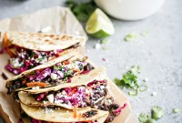Crispy Black Bean Tacos with Cilantro-Lime Slaw