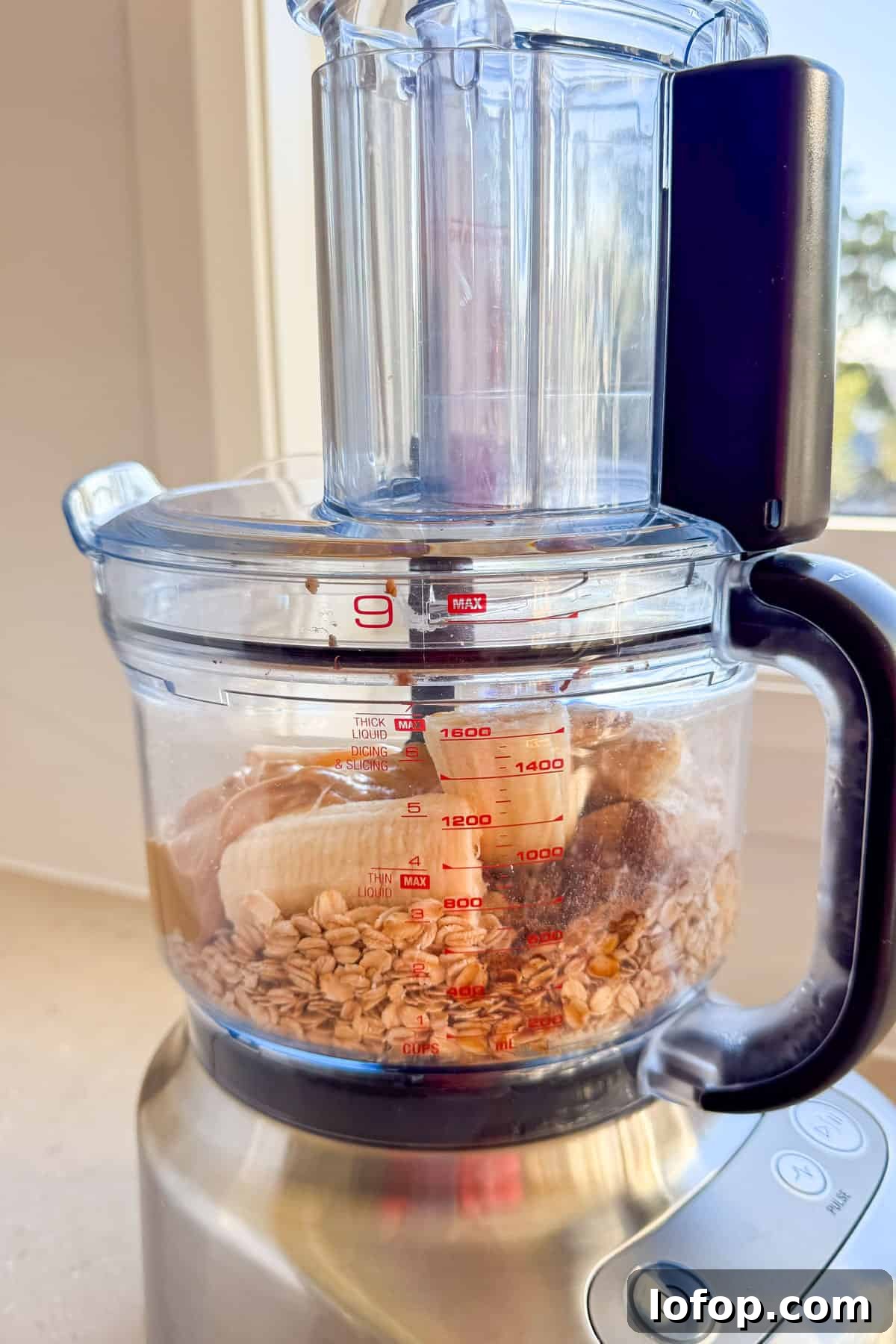 Raw ingredients added to a food processor.