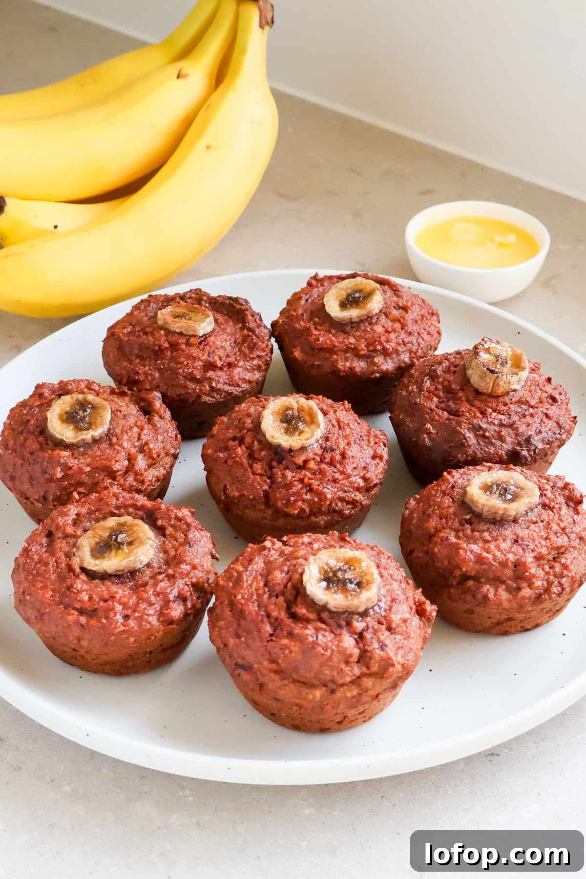 Beetroot muffins on a plate.