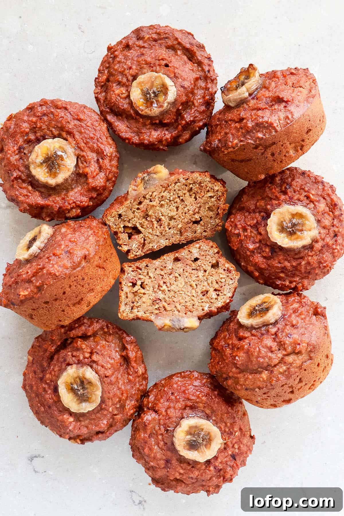 Top view of muffins and one cut in half.