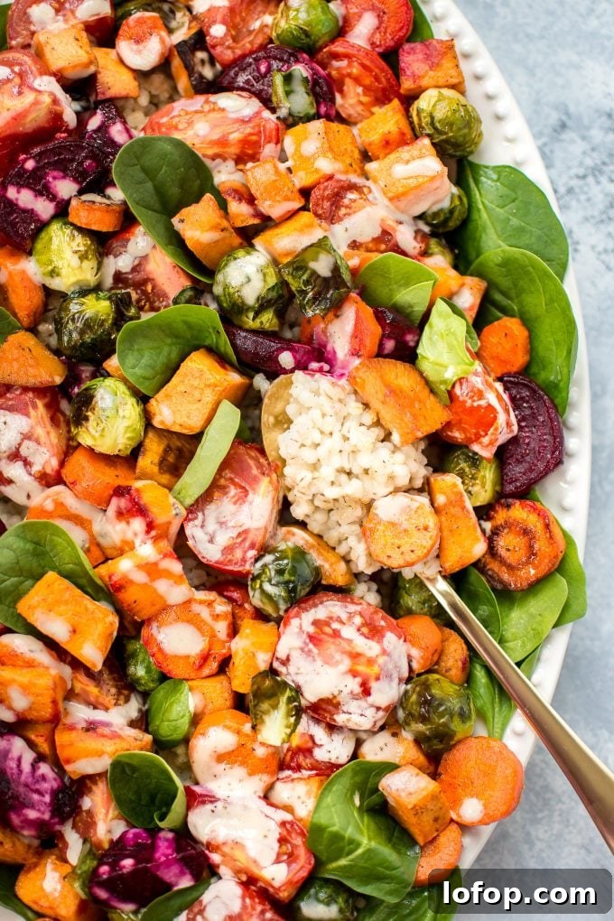 Roasted Vegetable and Barley Salad with Lemon Herb Dressing 5 close-up of roasted vegetable salad with spoon