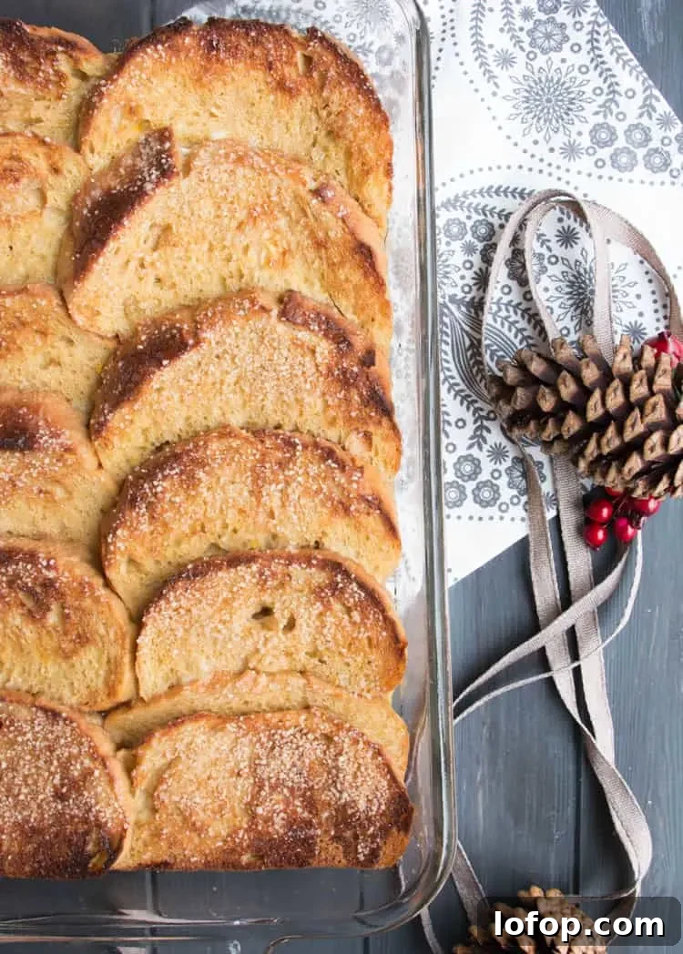 Overnight Eggnog French Toast. Easy, festive, make ahead breakfast. Hearty slices of bread baked in a creamy eggnog custard with a crunchy sugar topping!
