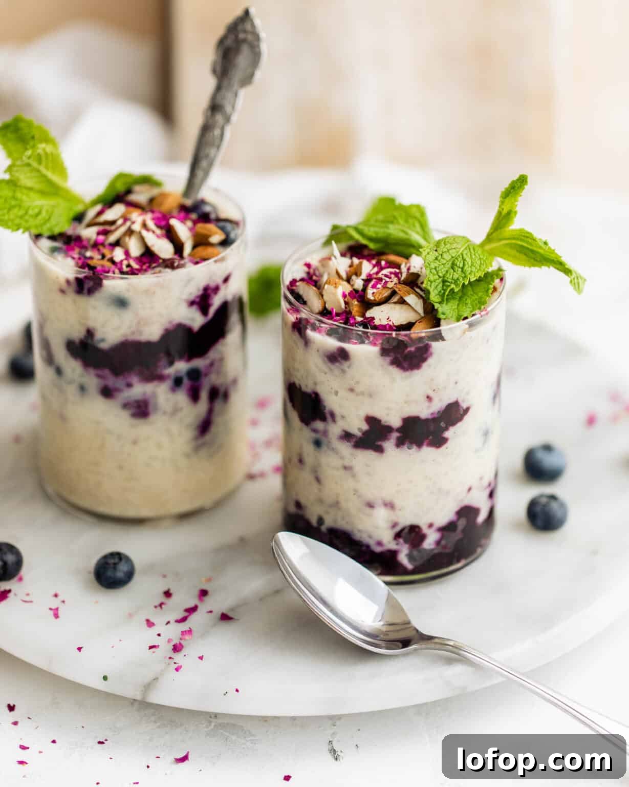 rice pudding in cups with blueberries