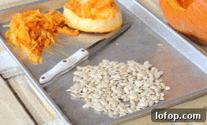 cleaned pumpkin seeds on pan.