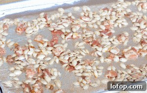 bacon and pumpkin seeds on pan.
