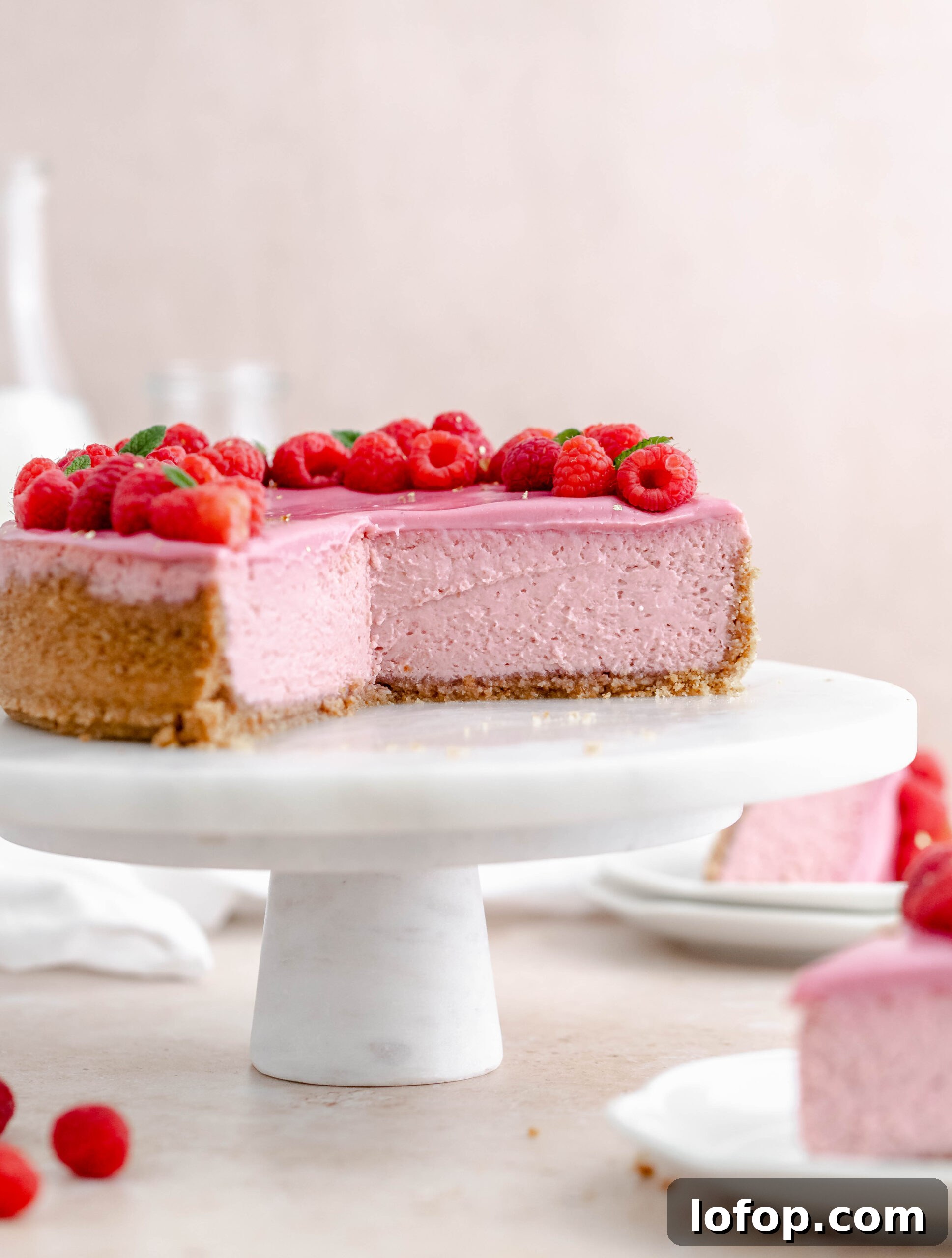 Decadent Raspberry Cheesecake Recipe with Fresh Berry Topping 4 Fresh and creamy Raspberry Cheesecake