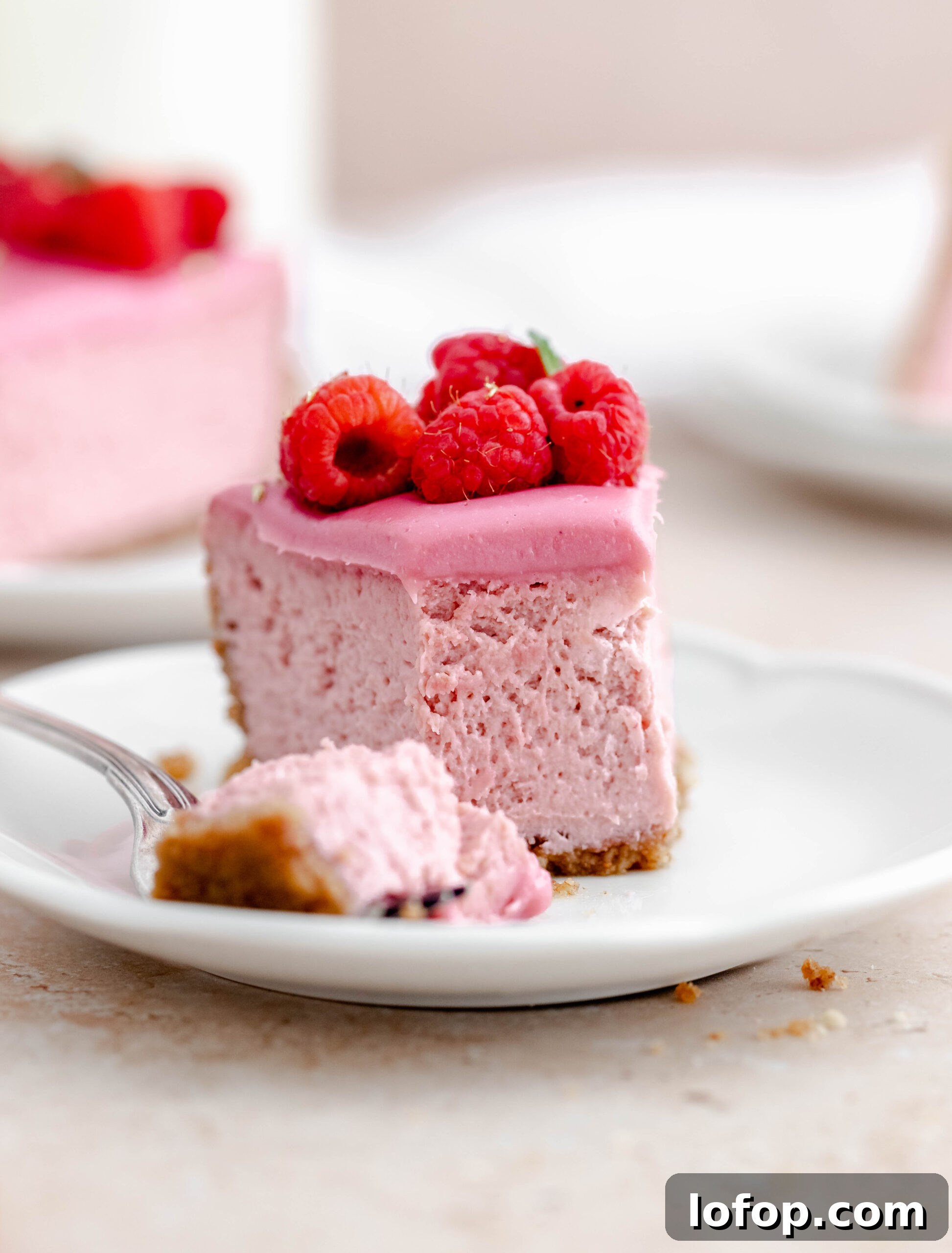 Decadent Raspberry Cheesecake Recipe with Fresh Berry Topping 5 img 1182 5