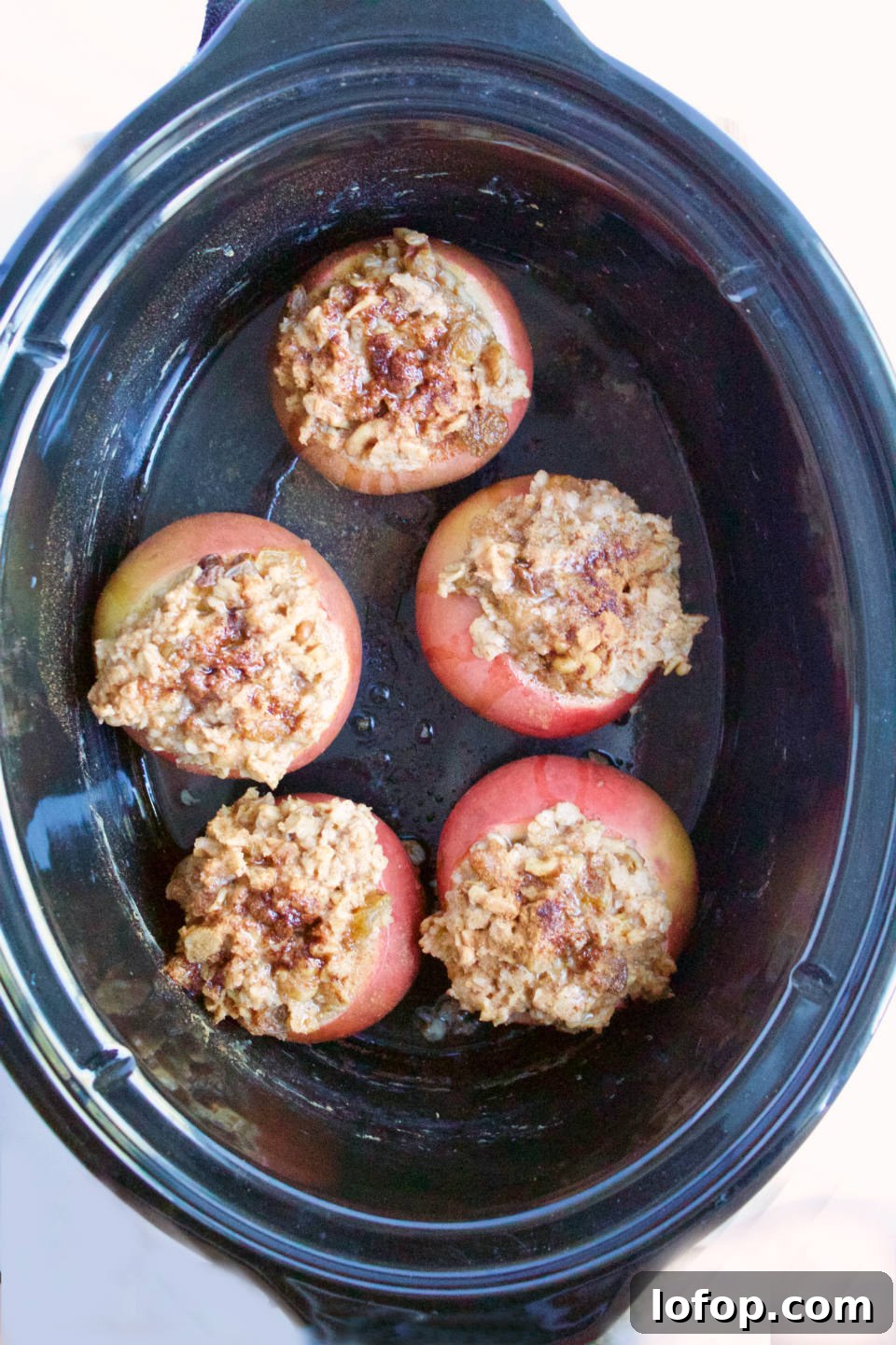 Slow Cooker Apple Oatmeal Cups: Baked-Style Breakfast Recipe 3 Slow Cooker Baked Apple Oatmeal Cups -- A healthy breakfast recipe that is good enough for dessert! No refined sugar | vegan | gluten free | @sinfulnutrition