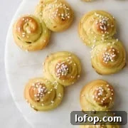 St. Lucia Buns on a marble plate.