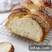 Sugar-topped Cardamom Bread (Finnish Pulla) on a colling rack.