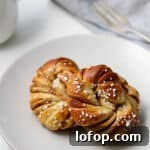 Close up view of a Swedish Cinnamon Bun (Kanelbullar).