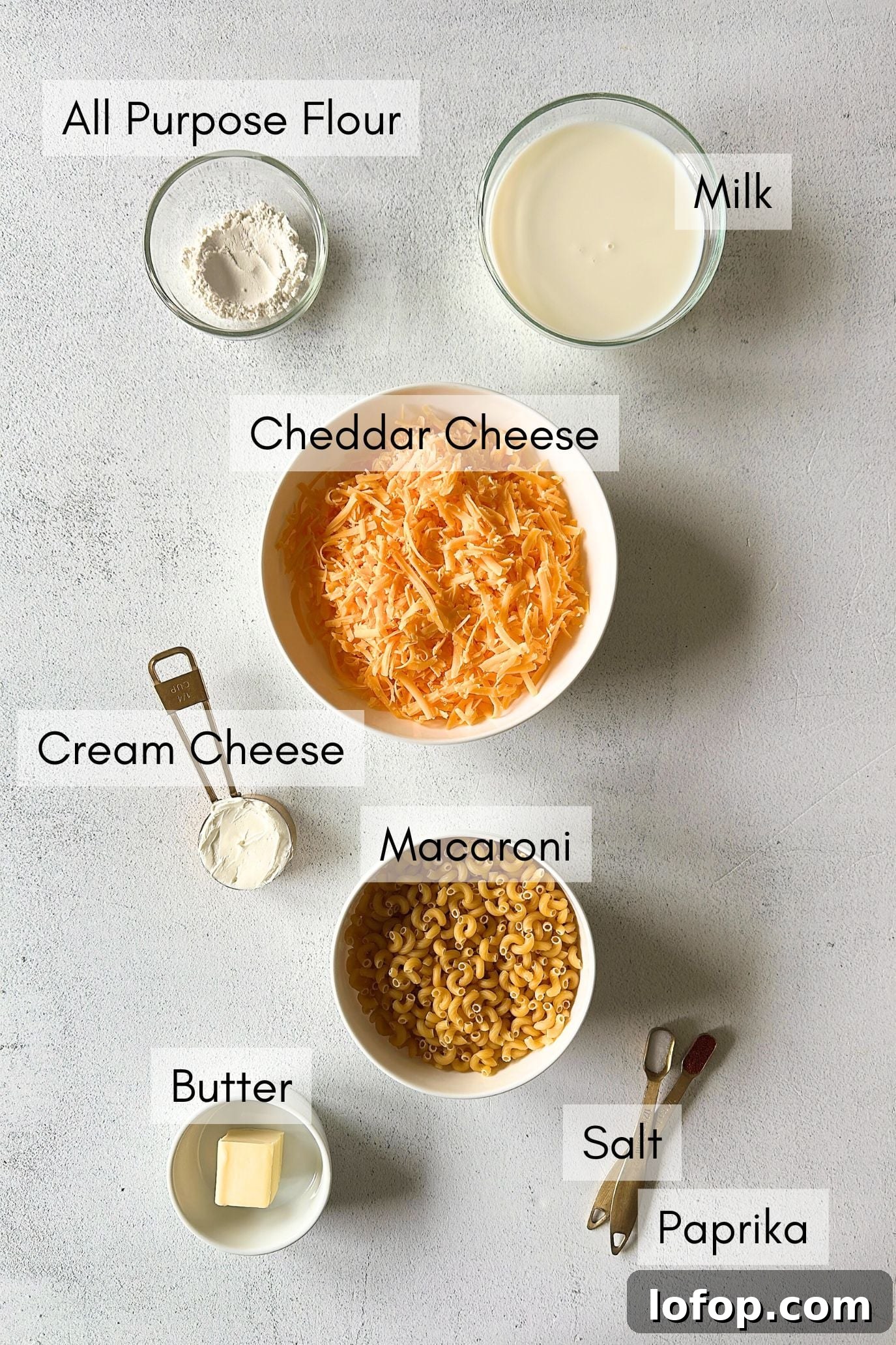 Ingredients to make mac and cheese muffins.