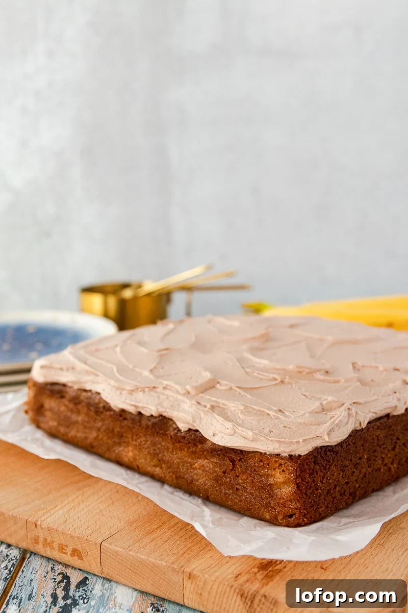 Moist Banana Snack Cake with Creamy Nutella Frosting 2 banana snack cake on a cutting board ready to serve