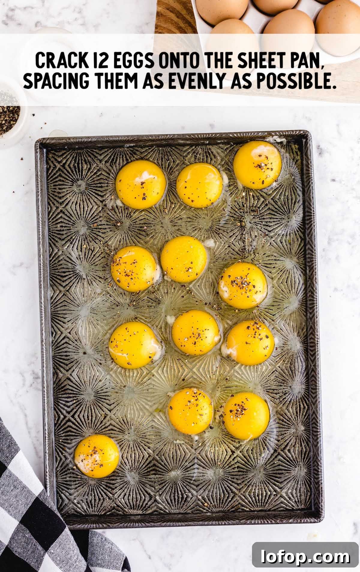 eggs cracked onto a sheet pan