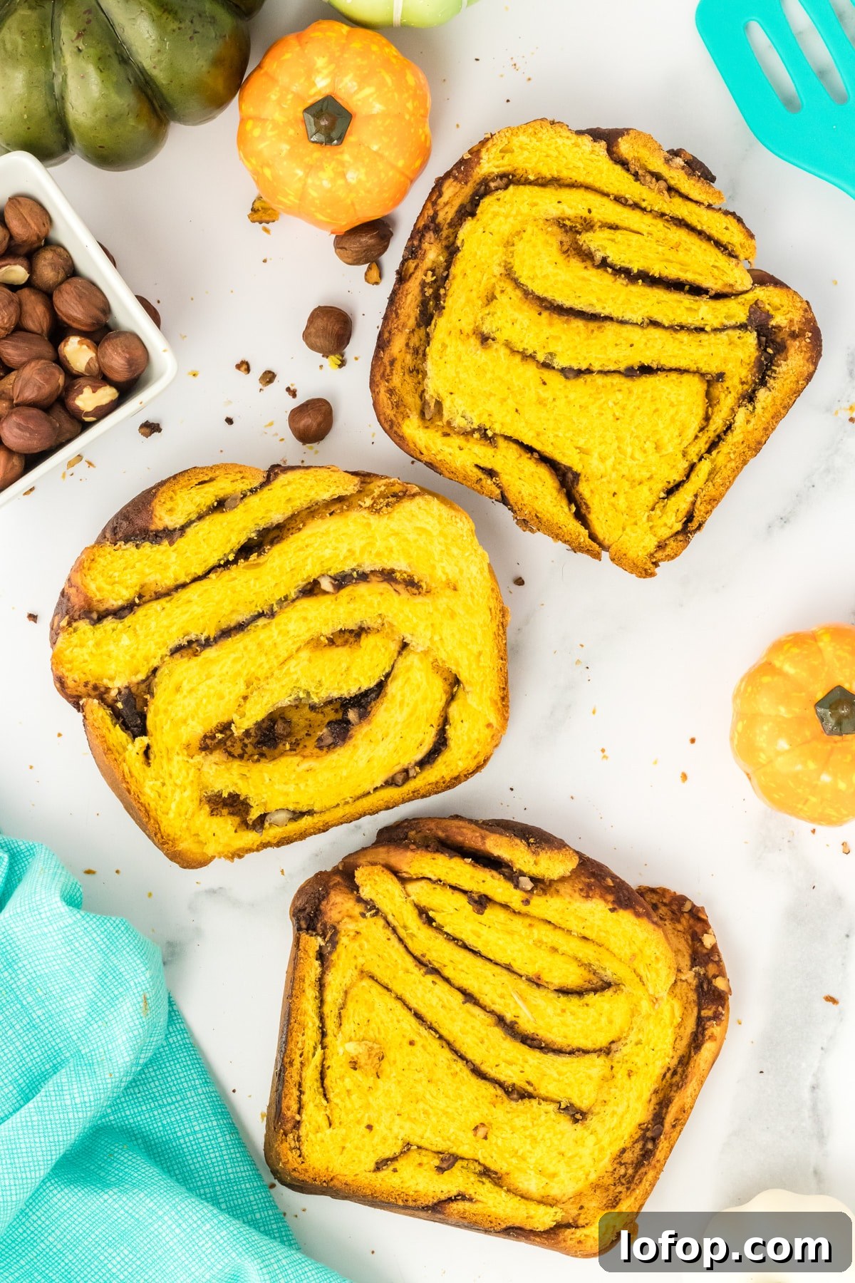 Top down view of slices of hazelnut babka bread with slices of chocolate filling - Hostess At Heart