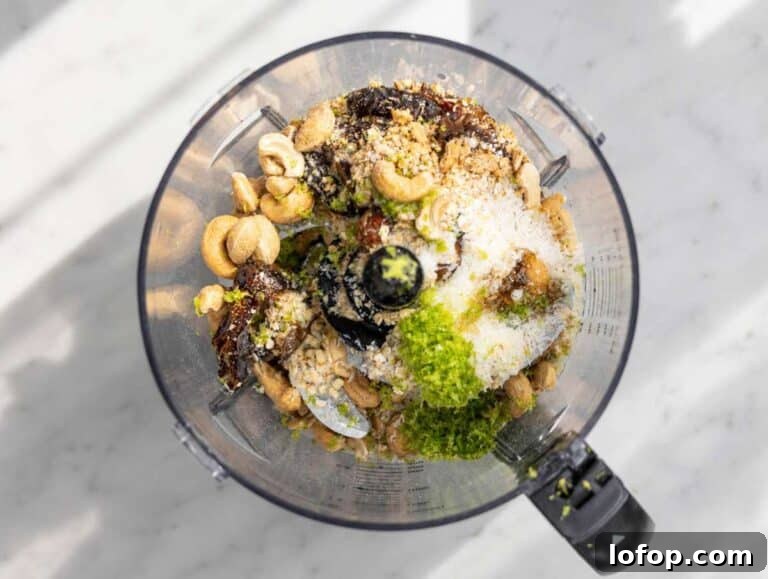 Step 1 Ingredients added to a food processor before blending into energy balls.