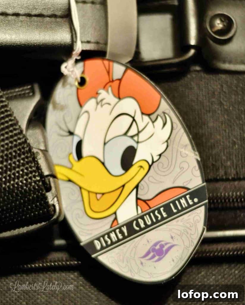 Disney Cruise Packing Checklist + Free Printable Guide 15 daisy duck disney cruise baggage tag.