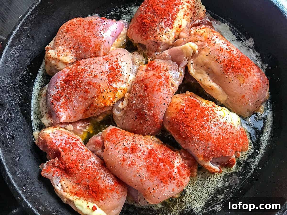 Chicken thighs with smoked paprika in pan
