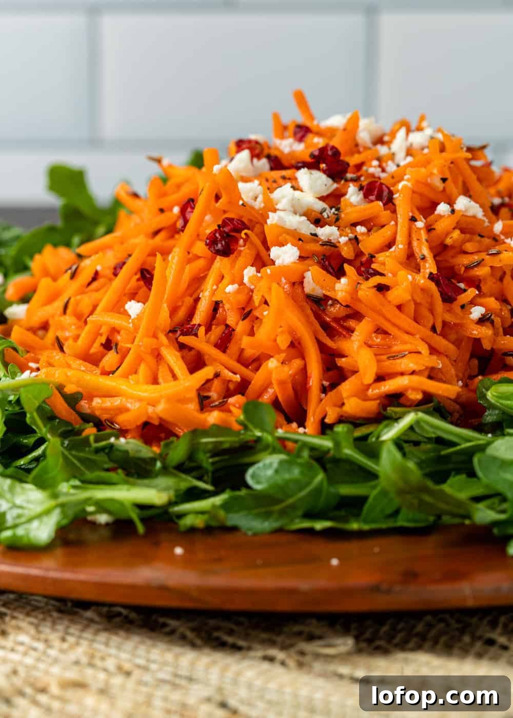 spicy Moroccan carrot salad topped with harissa and feta cheese