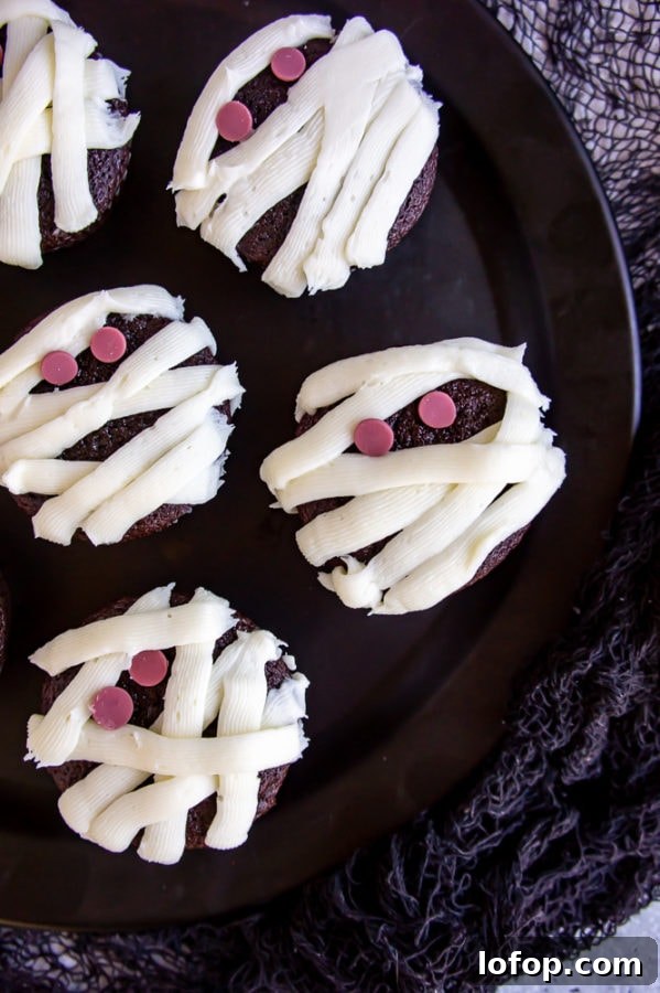 a platter of mummy cupcakes