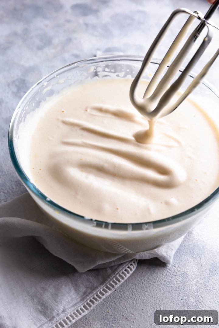 Classic French Fraisier Strawberry Cake Recipe 8 side close up of a cake batter for genoise sponge