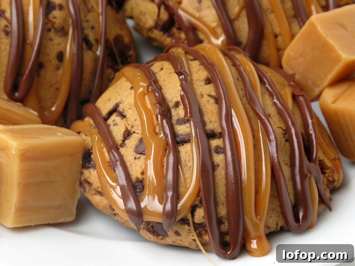 Closeup showing zigzag drizzle of chocolate and caramel over the top of the cookie.