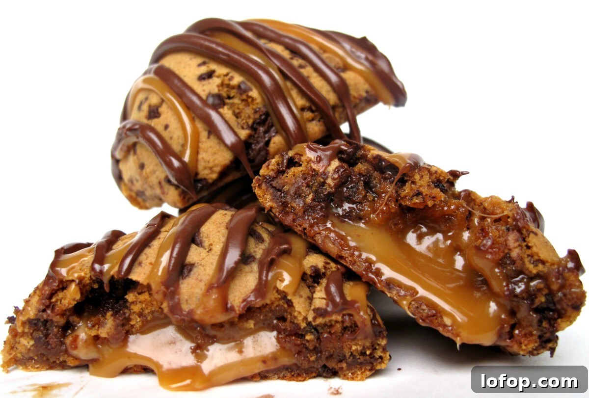 Cut open cookies showing gooey caramel center that melts when the cookie are warmed.