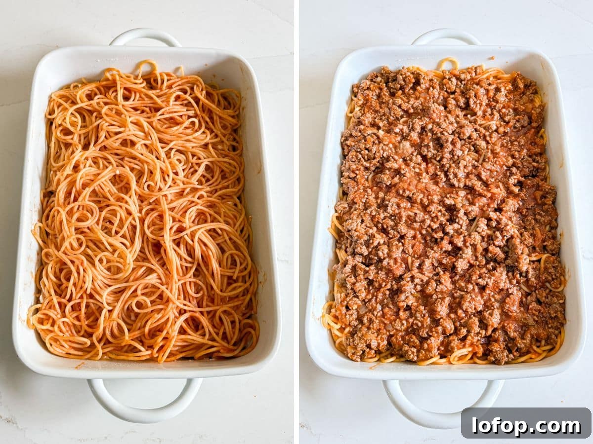 Ultimate Cheesy Baked Spaghetti Recipe for Comfort Dinner 8 More spaghetti and sauce on the pan and then the meat mixture on top.