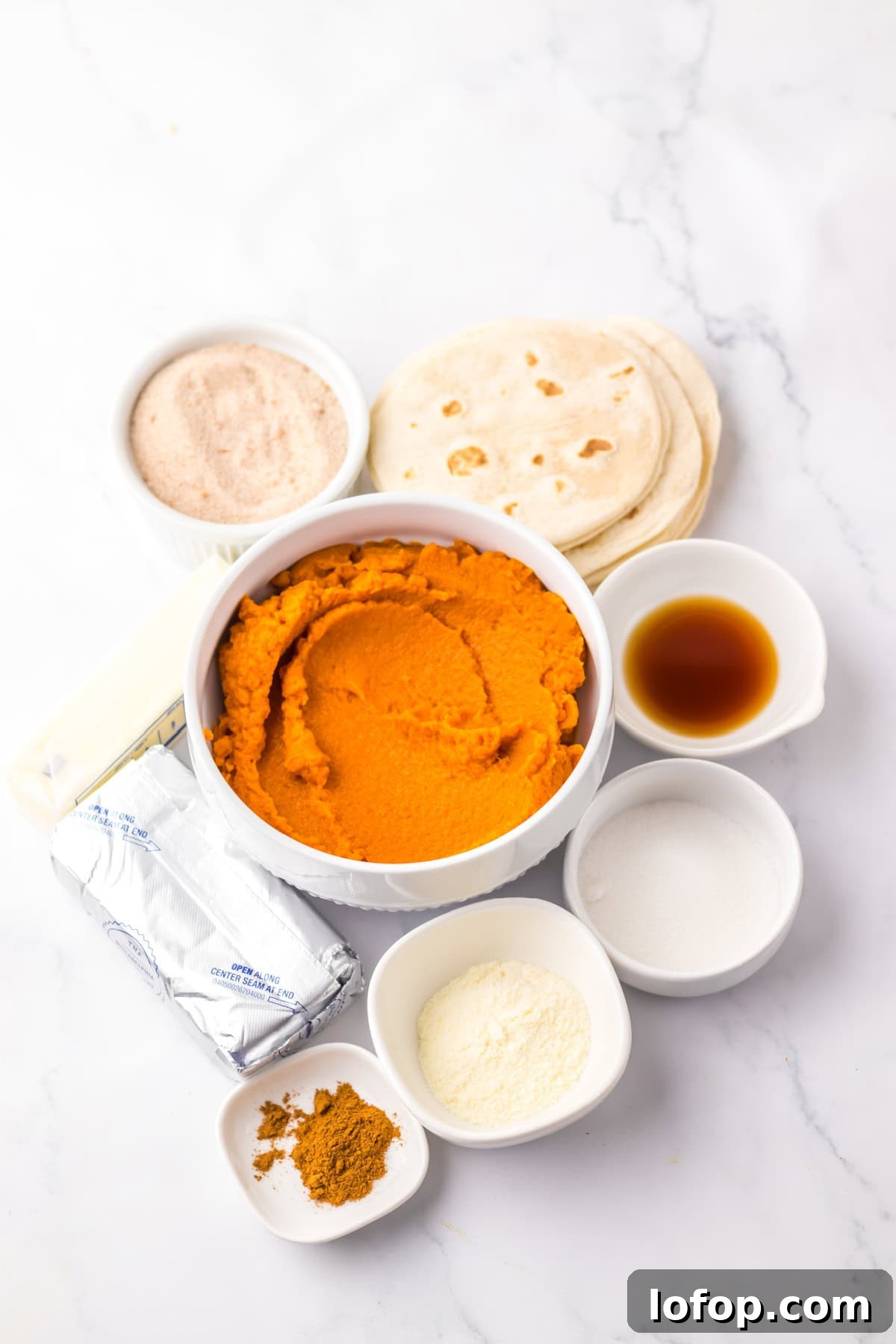 Overhead view of ingredients for pumpkin pie tacos