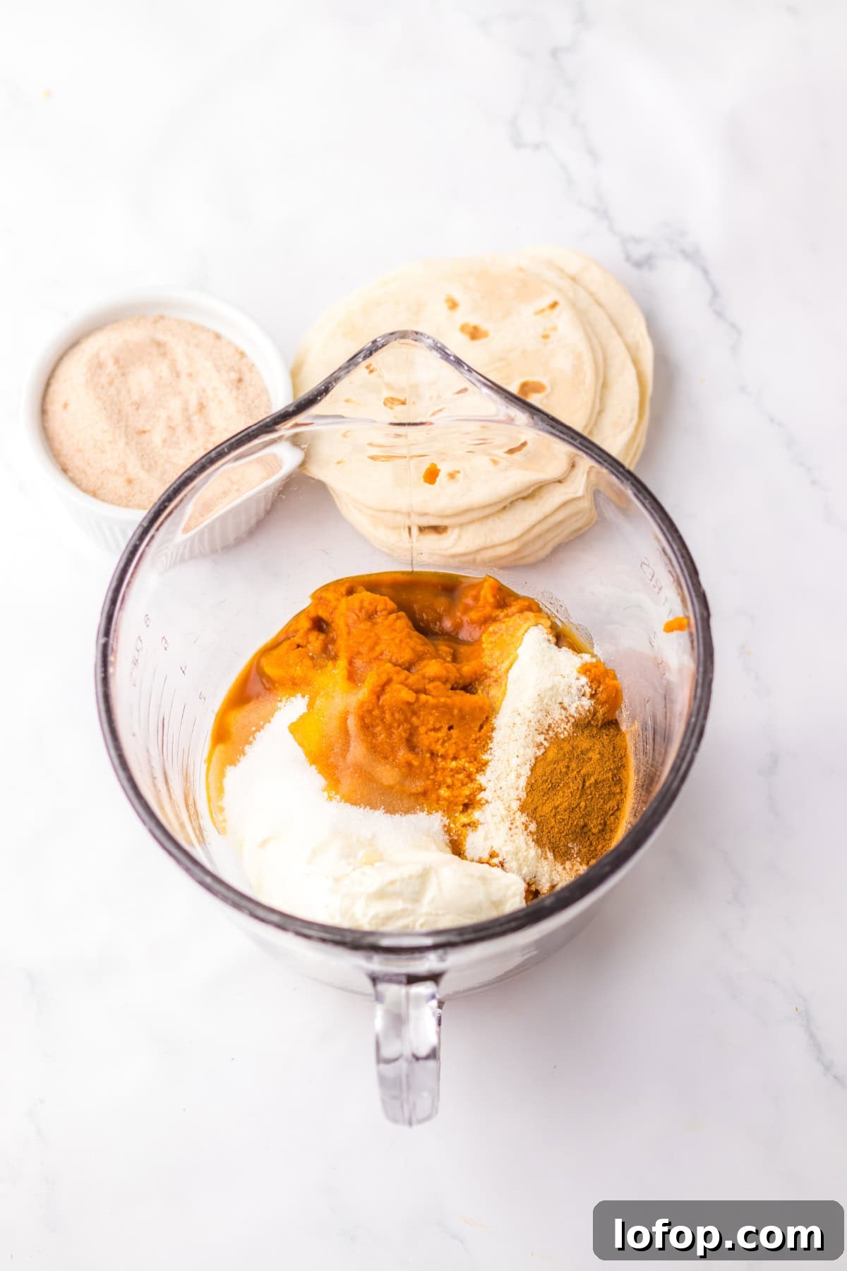 Mixing bowl with pumpkin filling ingredients