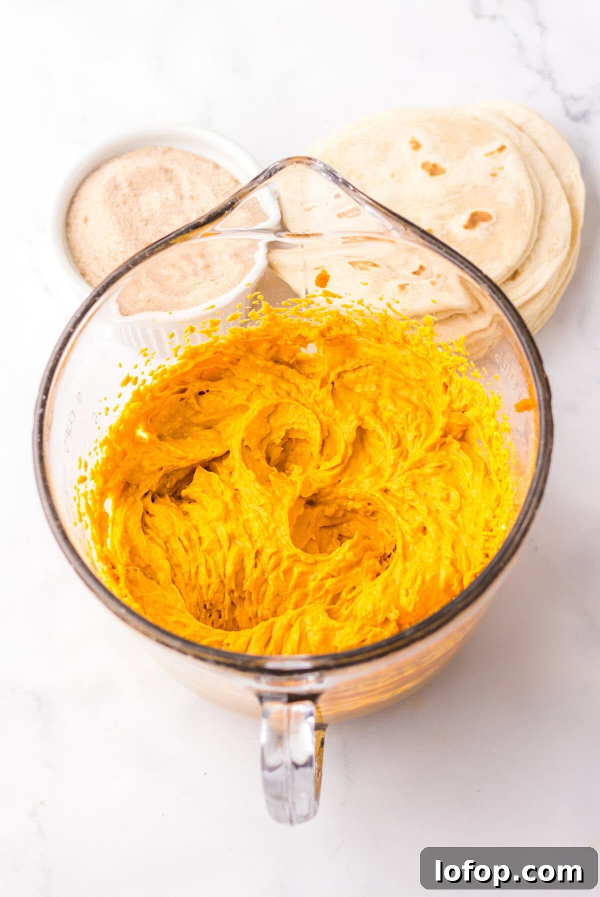 Blended pumpkin filling ready for piping