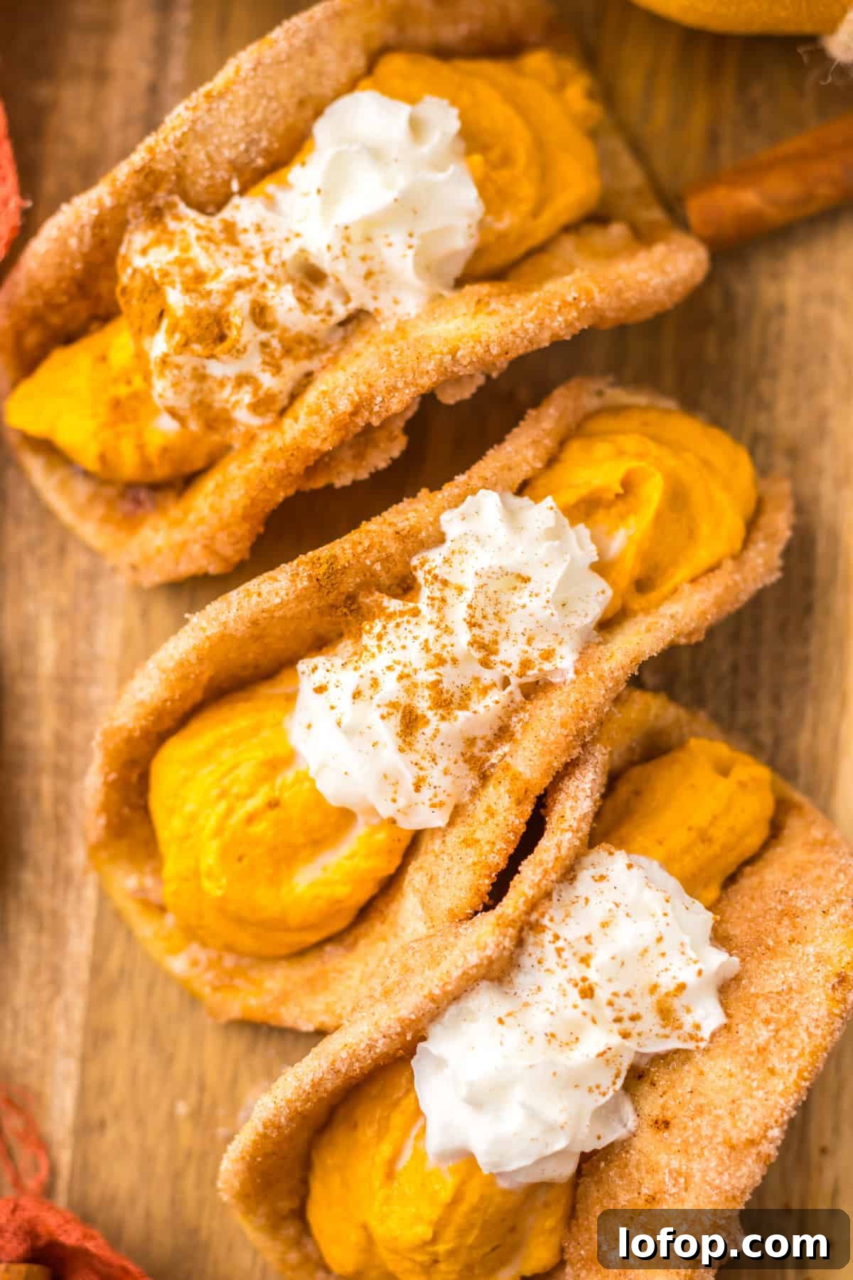 Close-up of mini tacos with whipped cream