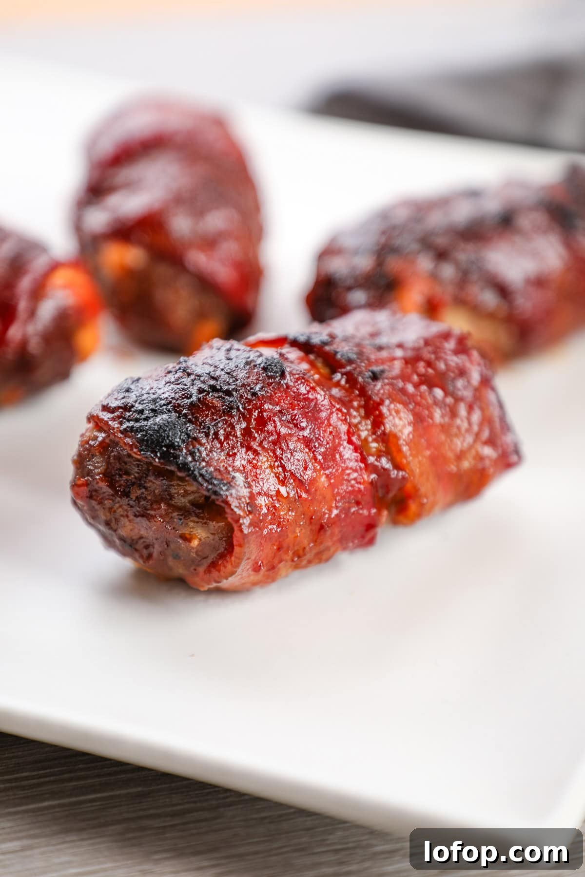 a bacon and sausage wrapped jalapeno popper. 