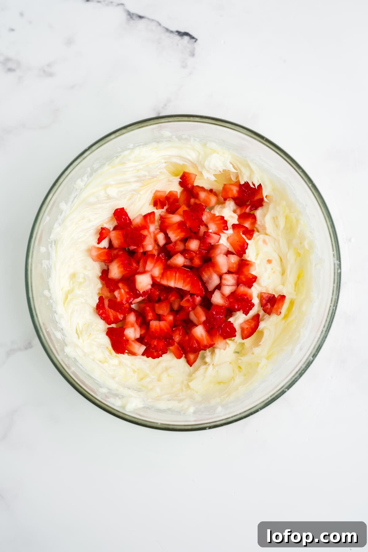 Homemade Strawberry Butter Recipe: Sweet Spread for Toasts and Baked Goods 6 Diced strawberries added into the mixture.