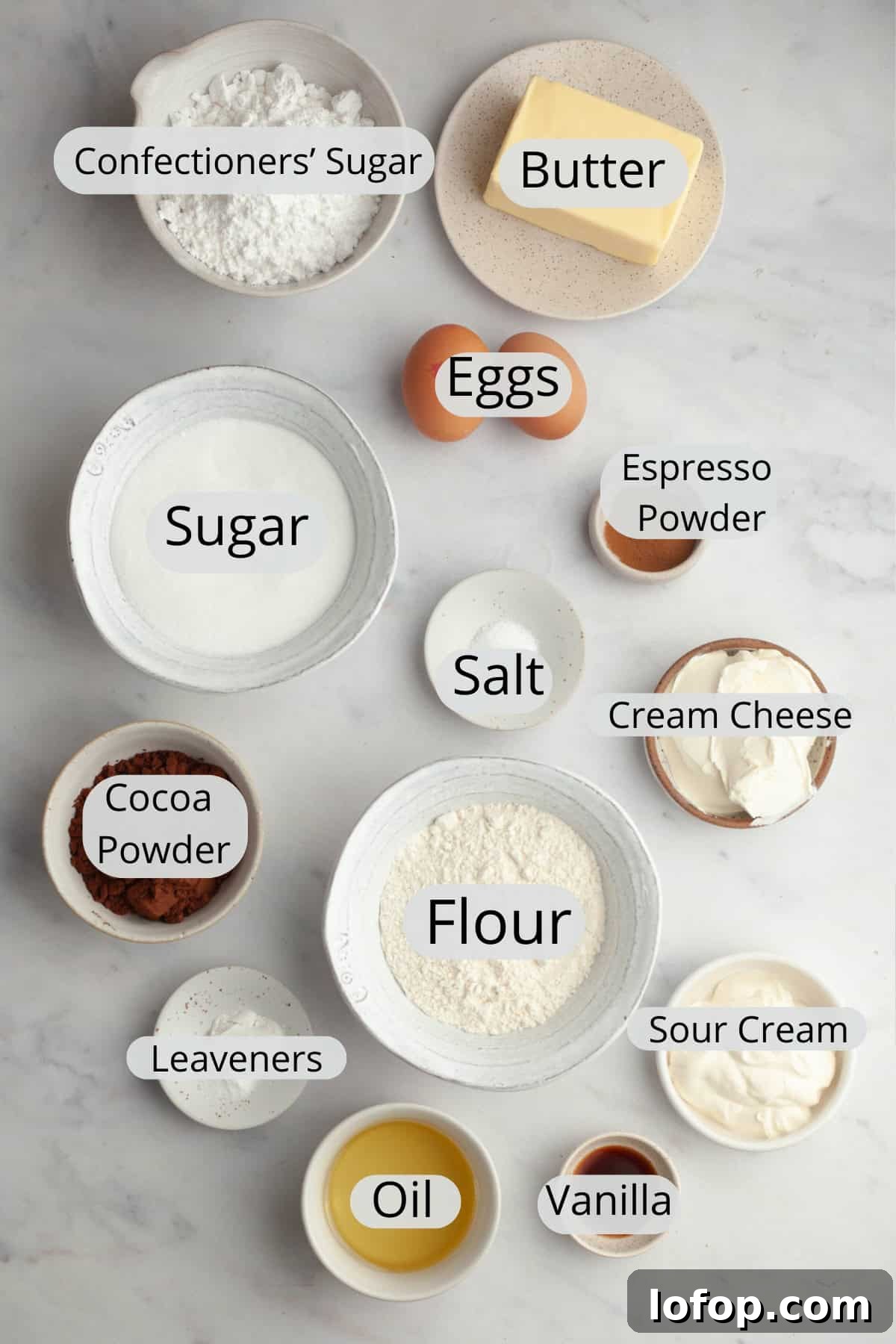 Decadent Chocolate Cupcakes with Cream Cheese Frosting 3 All the ingredients needed to make chocolate cupcakes with chocolate cream cheese frosting, weighed out into small bowls.
