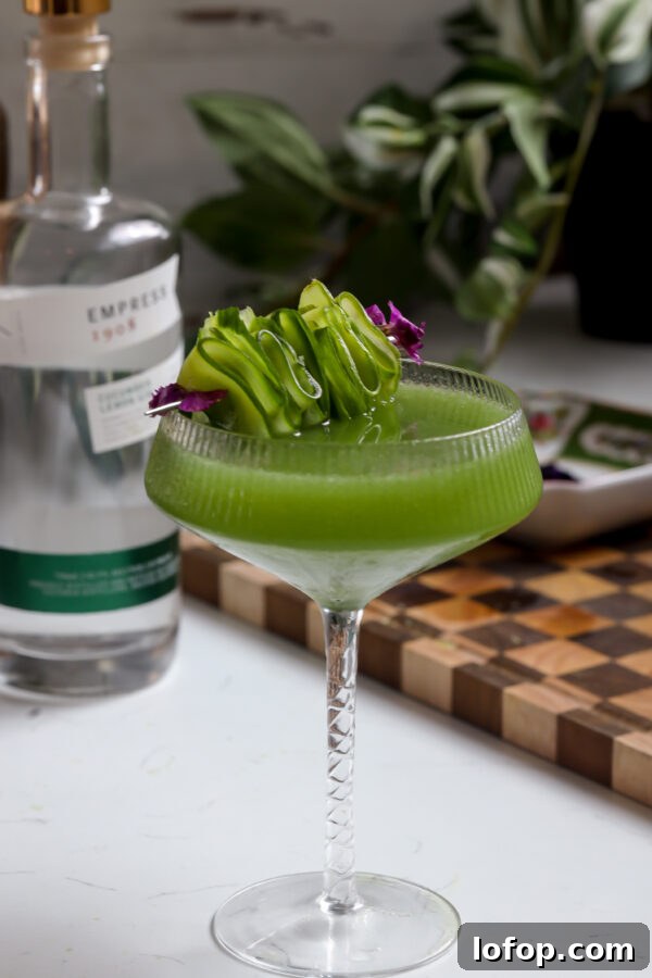 Miso-Marinated Black Cod Recipe for Tender, Flaky Fish 3 Cucumber martini made gin but you can make it with vodka, garnished with edible flowers and sliced cucumber.