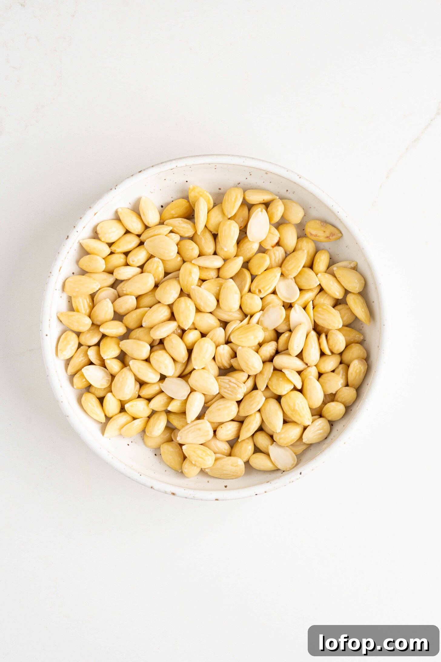 peeled almonds in a bowl