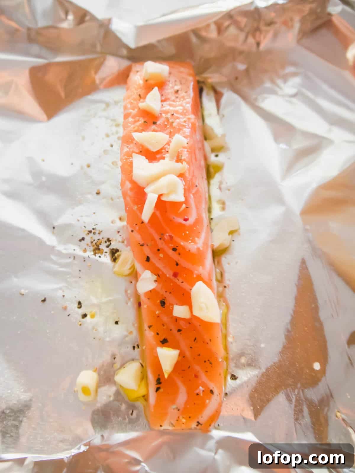 Salmon with garlic on top.