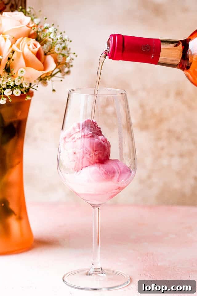 Pour rosé over two scoops of sorbet in a wine glass.