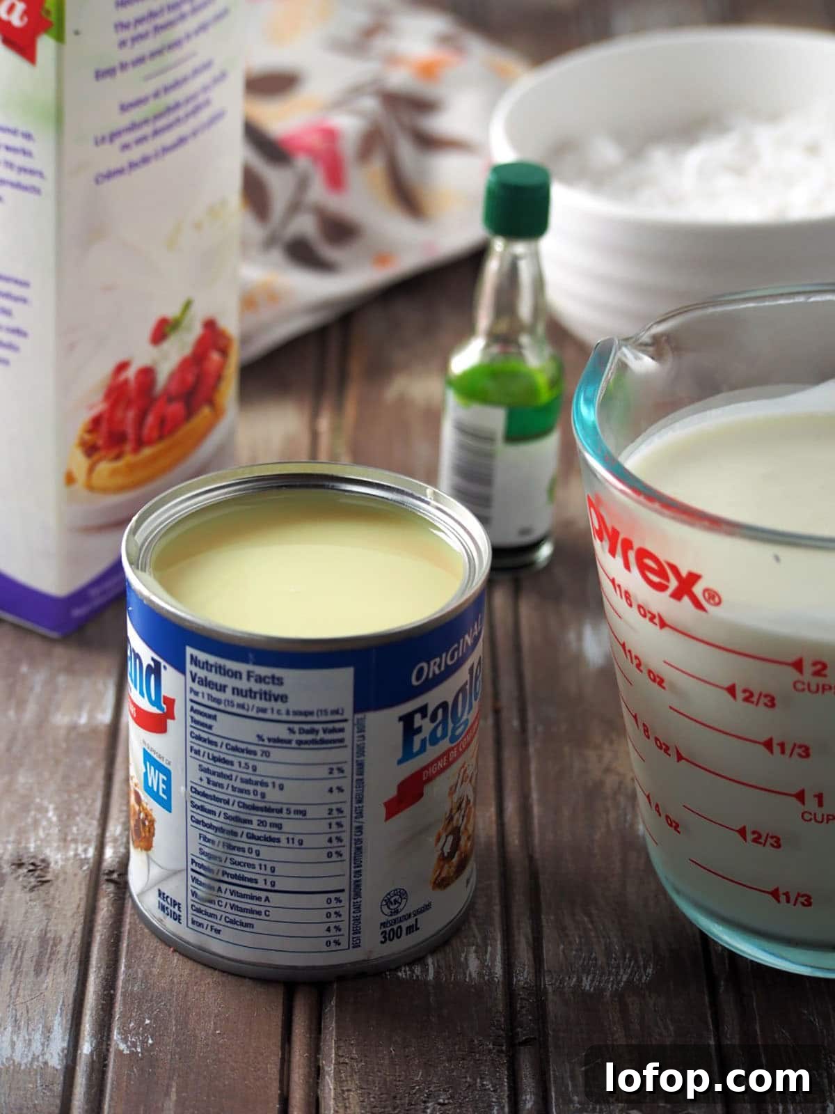 condensed milk, heavy cream, shredded young coconut, and pandan extract