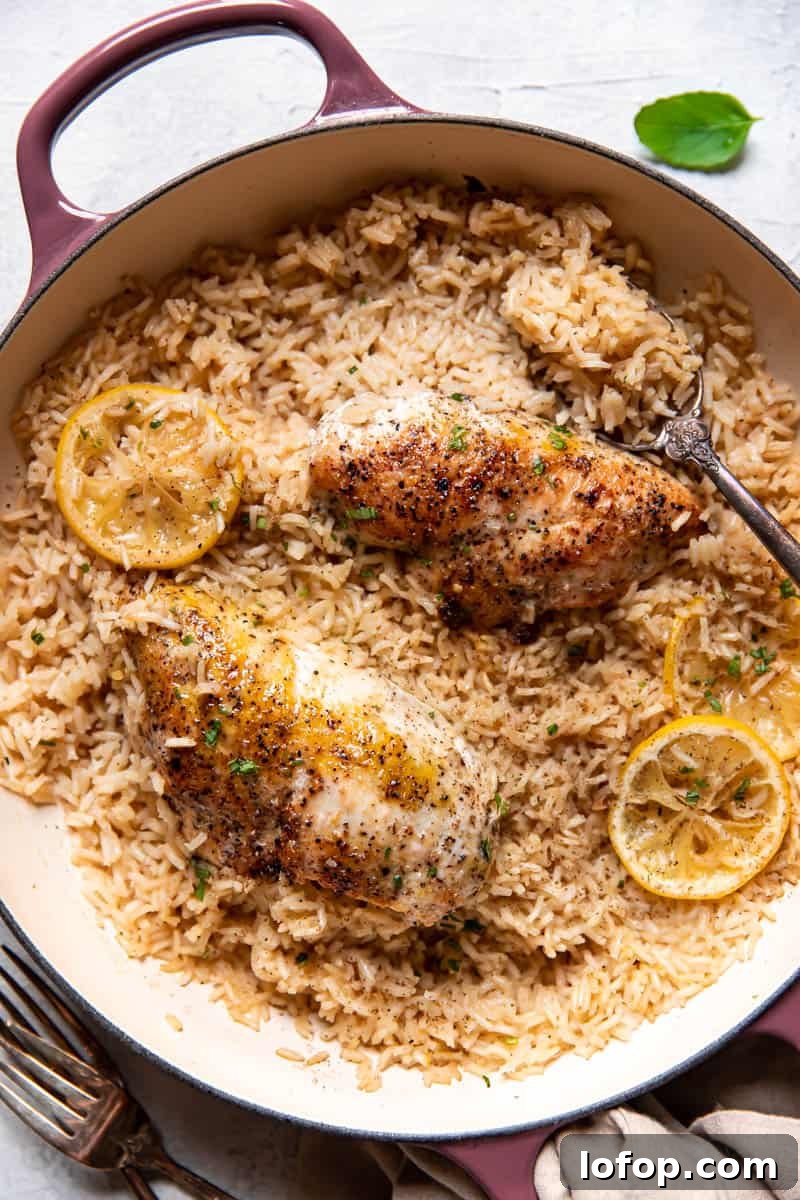 lemon chicken and rice in a pan.
