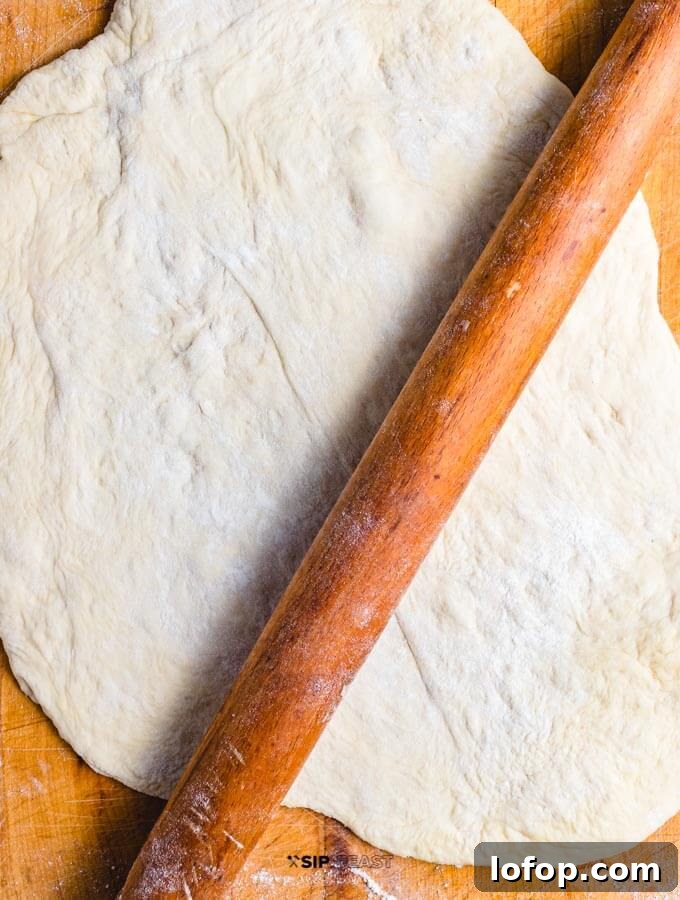 Rolled out store bought pizza dough.