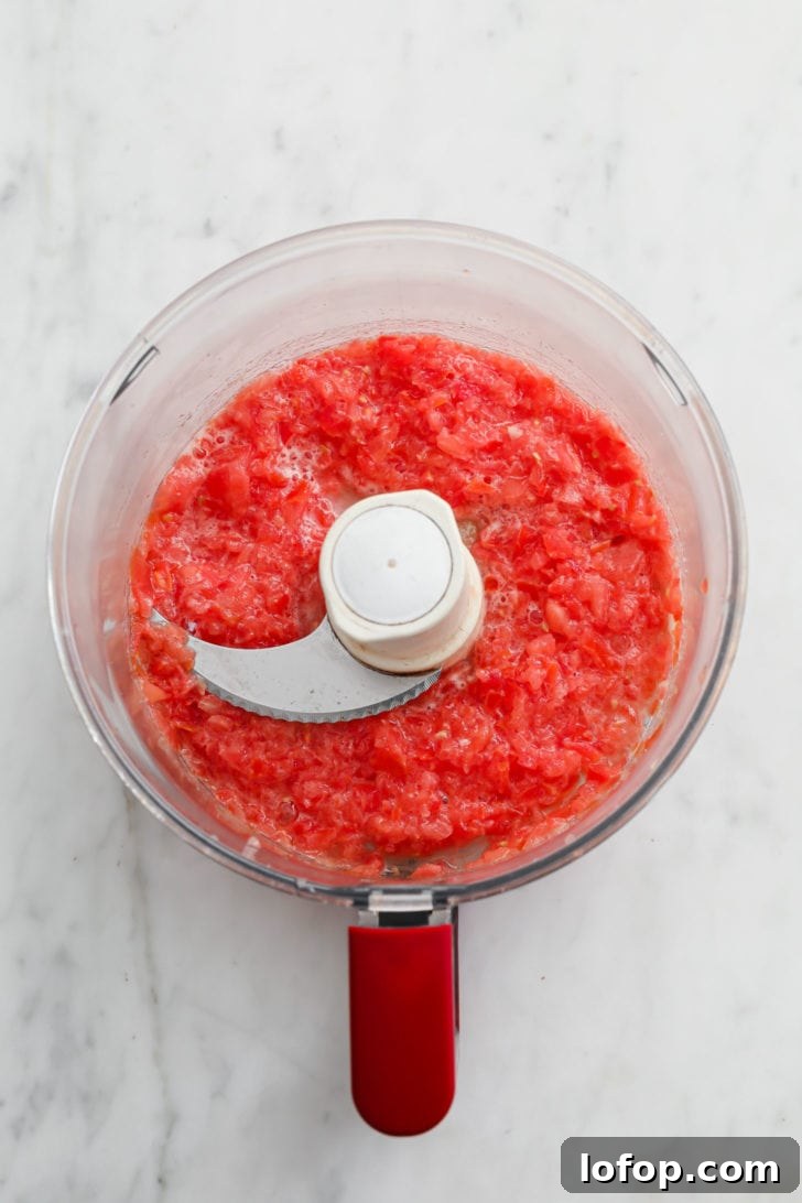 Pureed tomatoes in a food processor