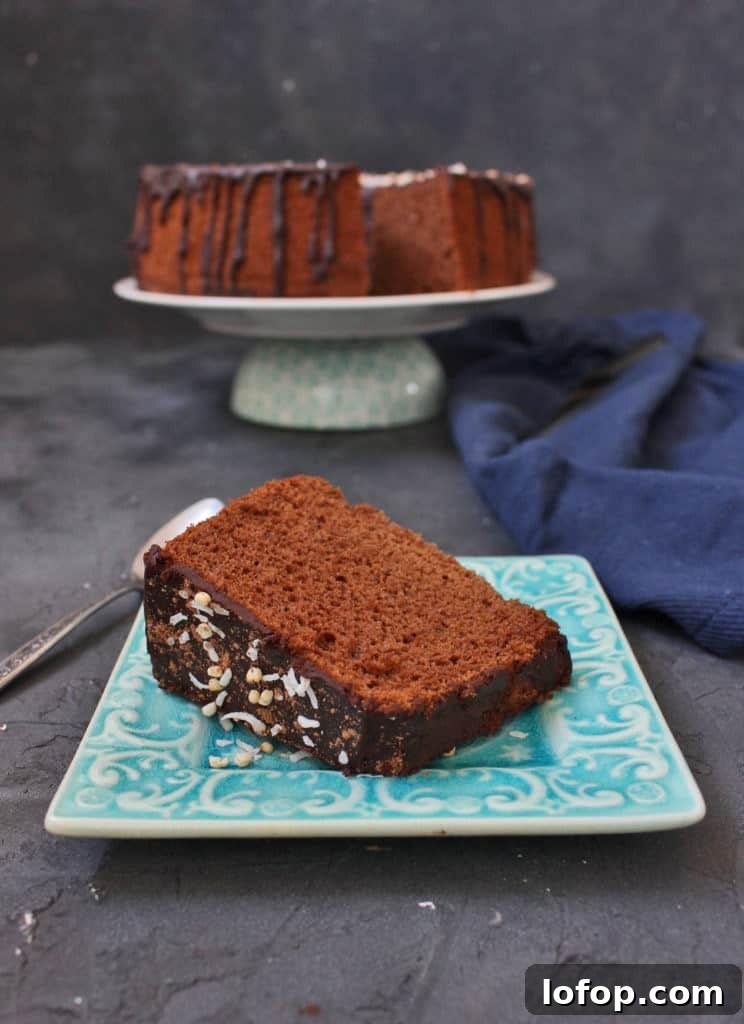 One slice of cake over a blue plate