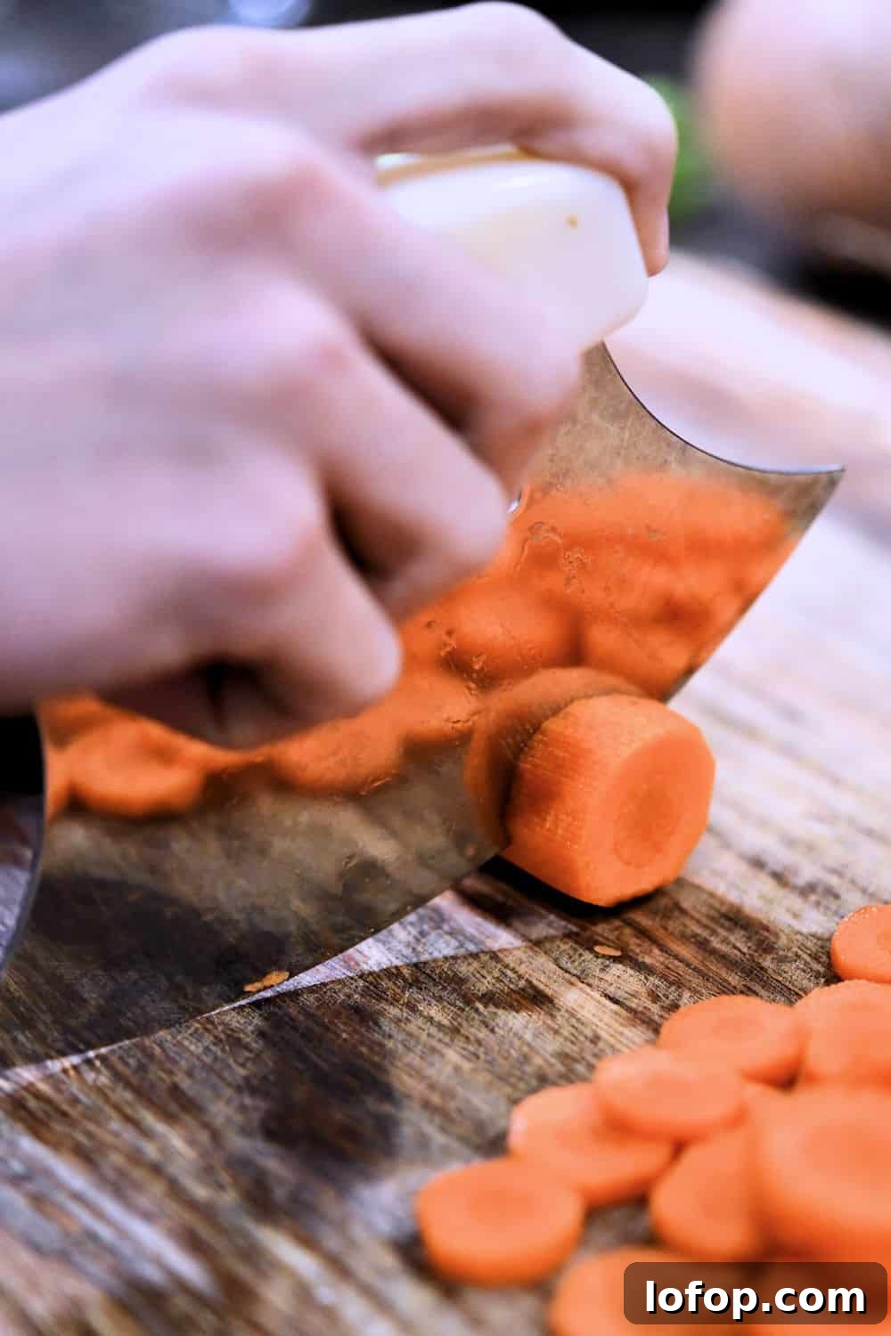 Creamy Instant Pot Red Potato Soup Recipe for Weeknight Meals 4 slicing carrots with an ulu knife