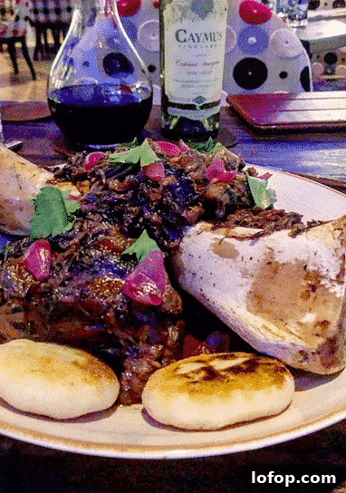 white plate piled high with a bone and marrow