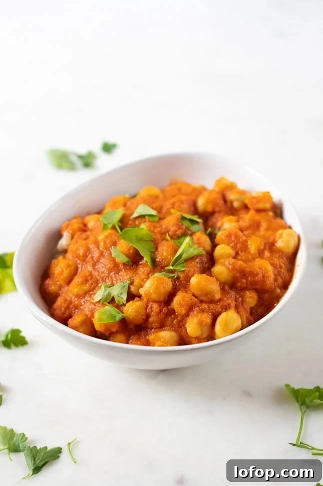 Authentic Vegan Chana Masala Recipe for Flavorful Chickpea Curry 5 Close-up photo of a bowl of vegan chana masala