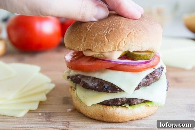 Double Decker Burger Recipe: How to Build a Juicy Stacked Burger 13 Pressing Homemade Burger Down with Hand to Compress