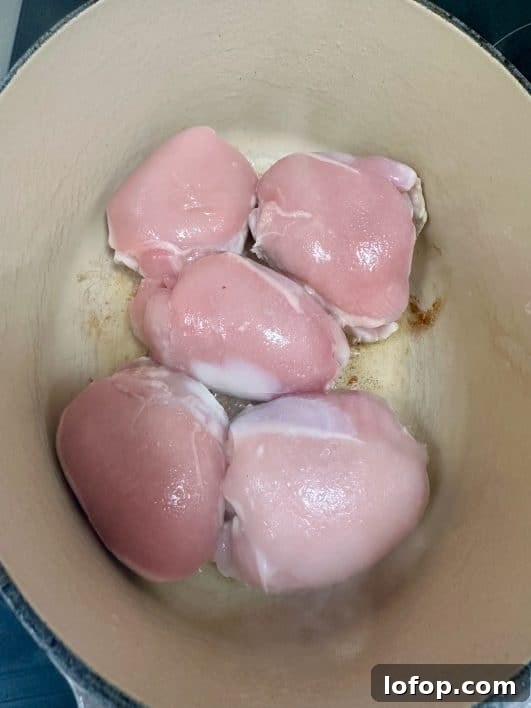Chicken thighs in a skillet