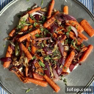 roasted carrot salad on a metal platter